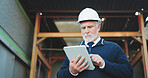 Civil engineer, online and man with tablet on construction site, scroll or renovation project on web. Confident, architect and mature person with technology, research and property development on app