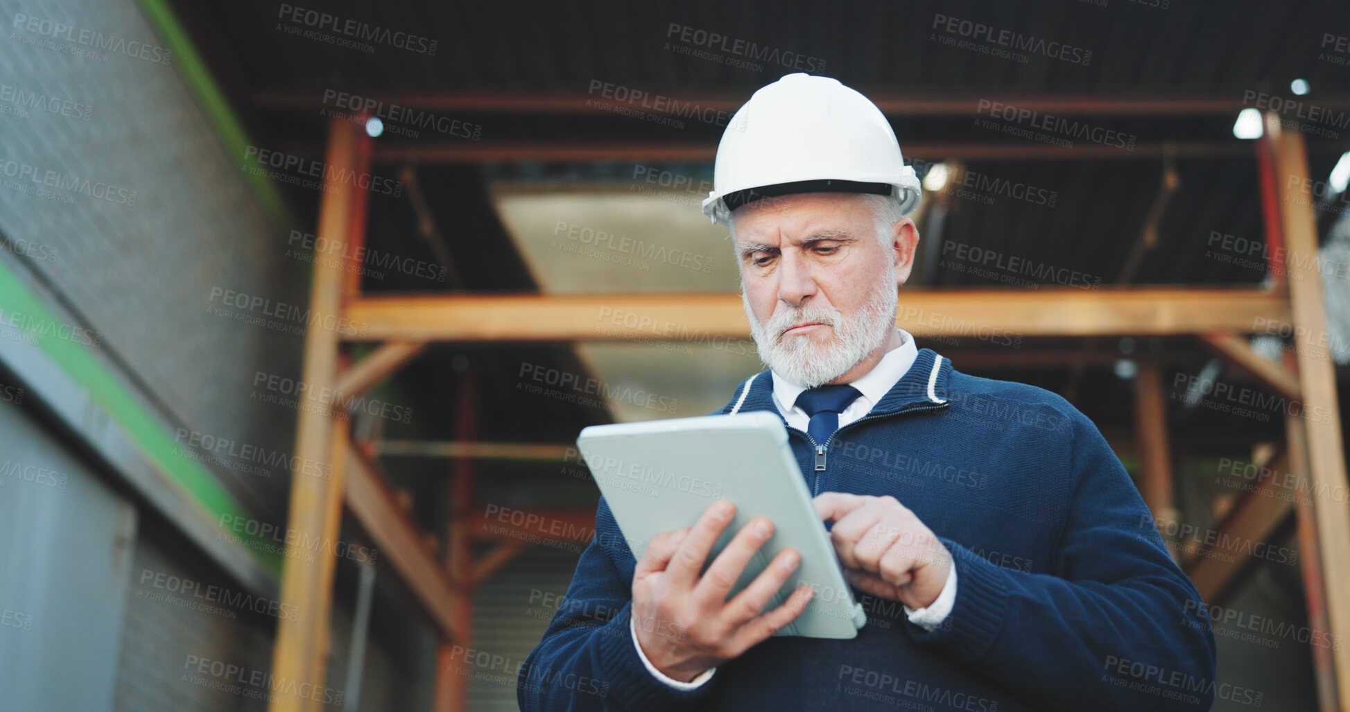 Buy stock photo Civil engineer, online and man with tablet on construction site, scroll or renovation project on web. Confident, architect and mature person with technology, research and property development on app