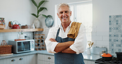 Buy stock photo Cooking, portrait and old man in kitchen with arms crossed, good mood and meal prep in retirement. Happy, apron and elderly person with confidence, positive attitude and culinary activity in house.