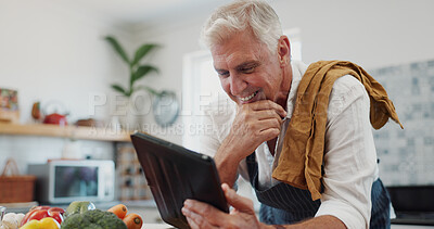 Buy stock photo Senior, man and cooking in kitchen with tablet, smile and browse internet to research online recipe. Happy, elderly person and tech in home with tutorial video, reading meal prep instruction or guide