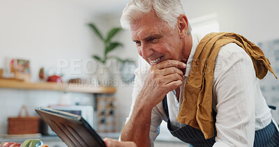 Buy stock photo Cooking, tablet and old man in kitchen with smile, thinking and browsing website for online recipe. Happy, senior person and tech in home with tutorial video, reading meal prep instruction and guide.