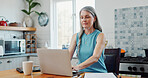 Mature, woman and typing in house with laptop, reading payslip and income budget for household bills. Person, research and check salary in home with computer, financial planning and utility expense.