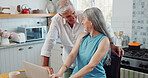 Mature, couple and happy in house with laptop, budget goals and complete payment of financial debt. Married people, smile and finance plan success with computer, liability settlement or satisfaction.