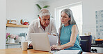 Mature, couple and document in home with laptop, discussion or filing tax return together on website. Married people, talk and wealth management in house with computer, paperwork and online research.