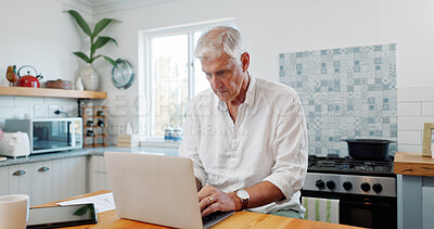 Buy stock photo Senior, man and typing in home with laptop, retirement plan and website to check long term savings. Pensioner, person and research in kitchen with computer, wealth management and investment account.