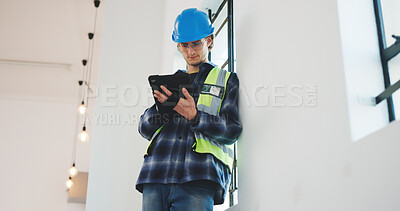 Buy stock photo Man, architect or construction with tablet for renovation, safety or security in building. Male person, civil engineer or contractor with technology for architecture project or development on site