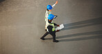 Architect, team and walking with tablet in warehouse for construction planning or instructions. Top view, people or civil engineer with documents or technology for building or architecture on space
