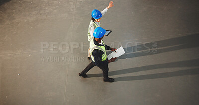 Buy stock photo Architect, team and walking with tablet in warehouse for construction planning or instructions. Top view, people or civil engineer with documents or technology for building or architecture on space