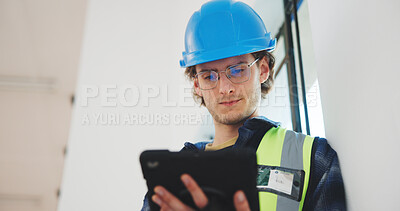 Buy stock photo Man, architect or construction with tablet in building for renovation, safety or security. Male person, civil engineer or contractor with technology for architecture inspection or development on site