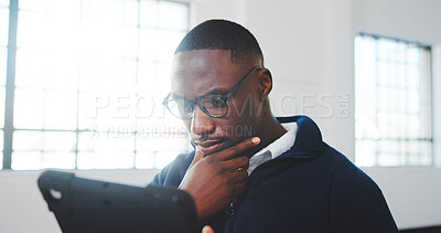 Buy stock photo Thinking, black man and reading in office with tablet, research and pricing for real estate. Thoughts, male realtor and ideas in workplace with tech, listing decision and schedule viewing for auction