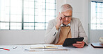 Architect, glasses and man with tablet in office, property development or construction costs on web. Reading, online and mature person with tech, project management and budget for building renovation