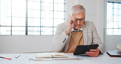 Buy stock photo Architect, glasses and man with tablet in office, property development or construction costs on web. Reading, online and mature person with tech, project management and budget for building renovation