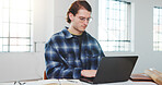 Architect, research and man with laptop in office, typing or planning for design project on website. Creative, online and person with technology, property development and info for building renovation