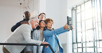 Buy stock photo Funny face, selfie and tablet with business people in office together for bonding or memories. Photograph, pout and technology with happy employee team in workplace for social media post or update