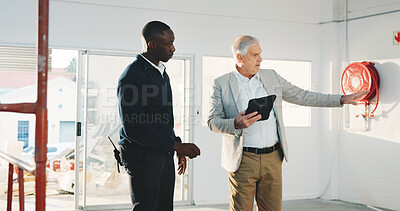 Buy stock photo Businessmen, real estate and tablet with conversation in corporate office space for purchase or rental. App, pointing and workplace tour people talking for introduction, property showing or question