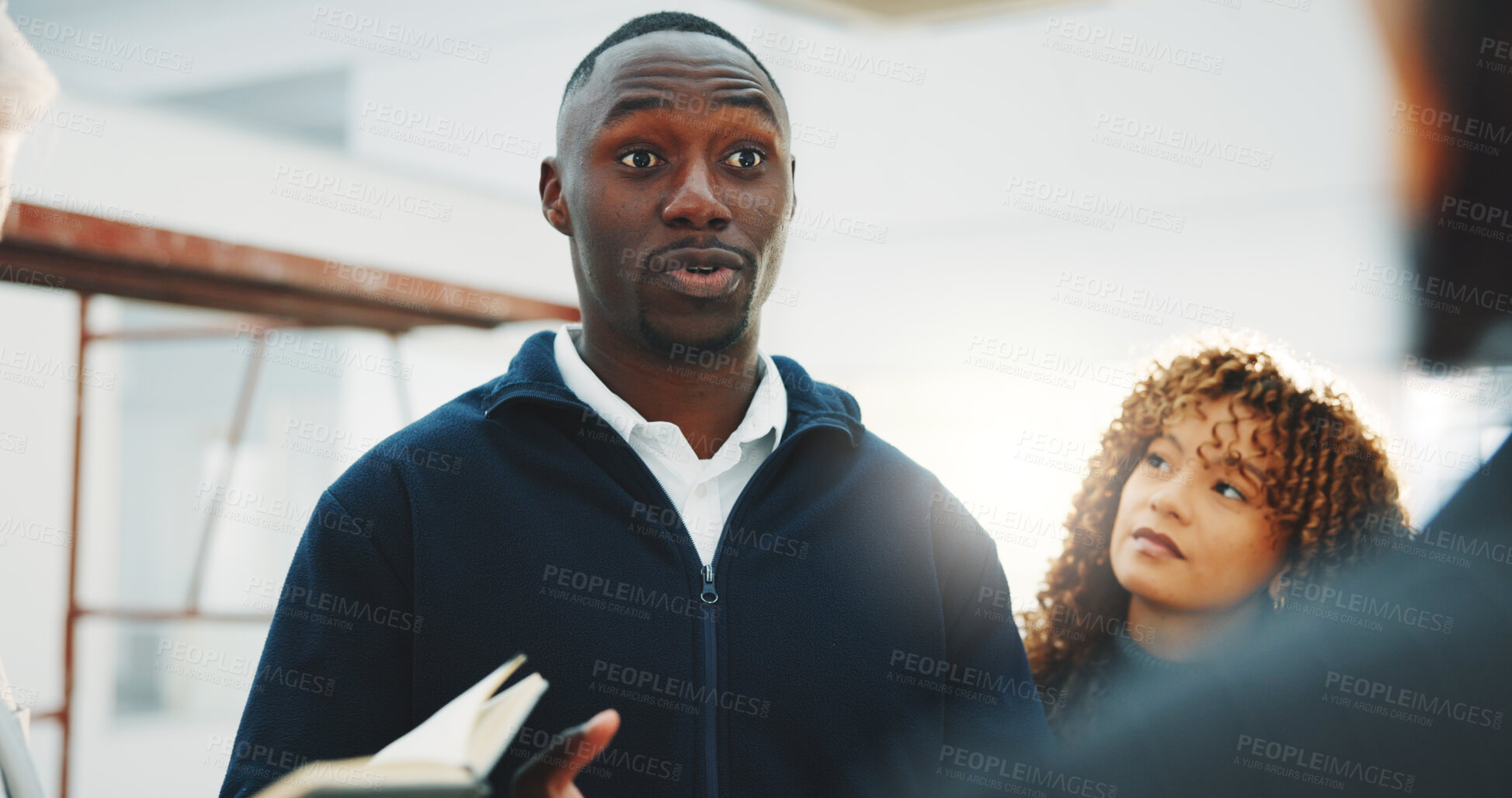 Buy stock photo Team, meeting and business people in office with feedback on property listing with remodeling. Notebook, renovation review and group of real estate agents with development project in workplace.