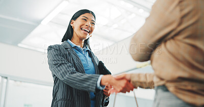 Buy stock photo Handshake, deal and business women in office with meeting, sale or closing on property listing. Welcome, happy and real estate agent shaking hands with client for lease agreement at agency from below