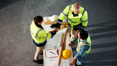 Buy stock photo Architect, handshake and men with blueprint in meeting, above or celebration for renovation project. People, shaking hands and collaboration for construction success, civil engineering and discussion
