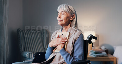 Buy stock photo Senior, hug or happy woman with picture frame in wheelchair for good memory, past moment or comfort. Elderly, widow or female person with a disability or photo for peace or relief in retirement home
