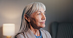 Old woman, thinking and retirement in home with past perspective, history or memory for mindfulness. Reflection, remember or mindset with senior person, pensioner and nostalgia with daydreaming