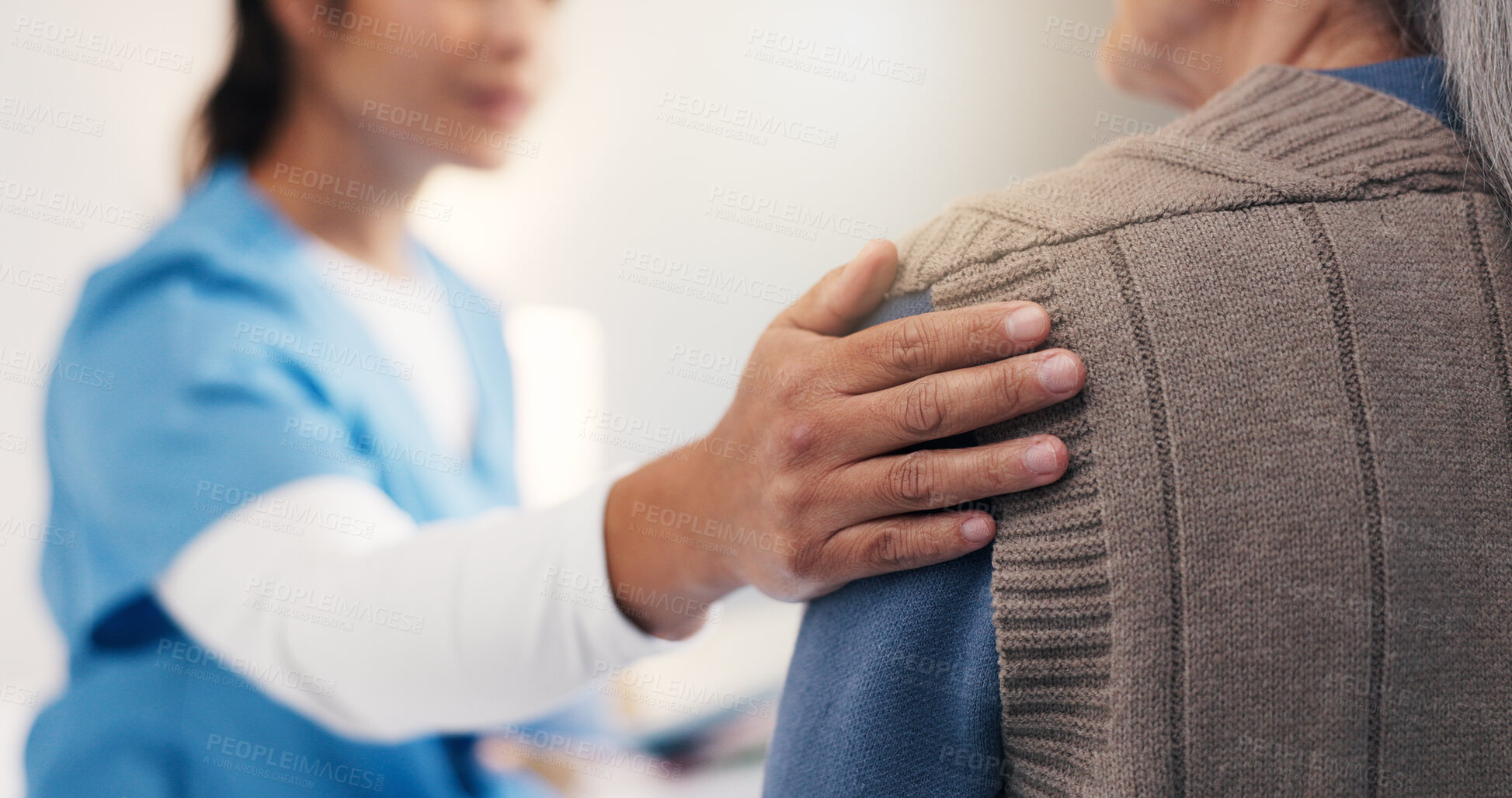 Buy stock photo Hand, healthcare and shoulder of old woman with nurse in retirement home for care or feedback. Consoling, conversation and medical professional with senior patient for comfort, consulting or support