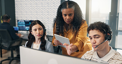 Buy stock photo Coaching, feedback and technology with people in call center for development or support training. Computer, headset and tablet with floor manager speaking to employee team for customer service review
