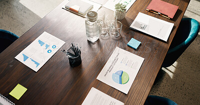 Buy stock photo Above, table or paperwork in empty office with data, sales revenue charts or business stats proposal. Meeting, boardroom and documents in workplace with income forecast, graphs and plan for company.