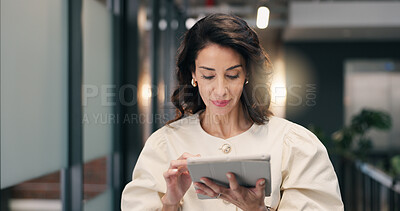Buy stock photo Businesswoman, walk and scroll in office with tablet, review press release and social media comment. Mature person, public relations manager and reading with tech, check PR statement and online news.