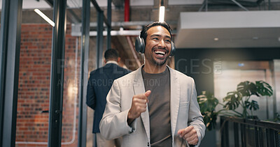 Buy stock photo Streaming, dance and man in office with headphones, song rhythm and listening to music playlist. Happy, tech and employee in agency with fun time, upbeat groove and radio subscription on audio app.