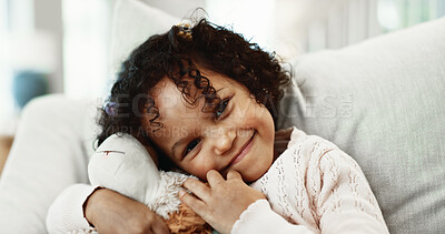 Buy stock photo Portrait, child and hug with teddy bear in home for holiday, fun childhood or development on sofa. Girl, kid or toddler with smile, stuffed animal or embrace for comfort toy or weekend break in house