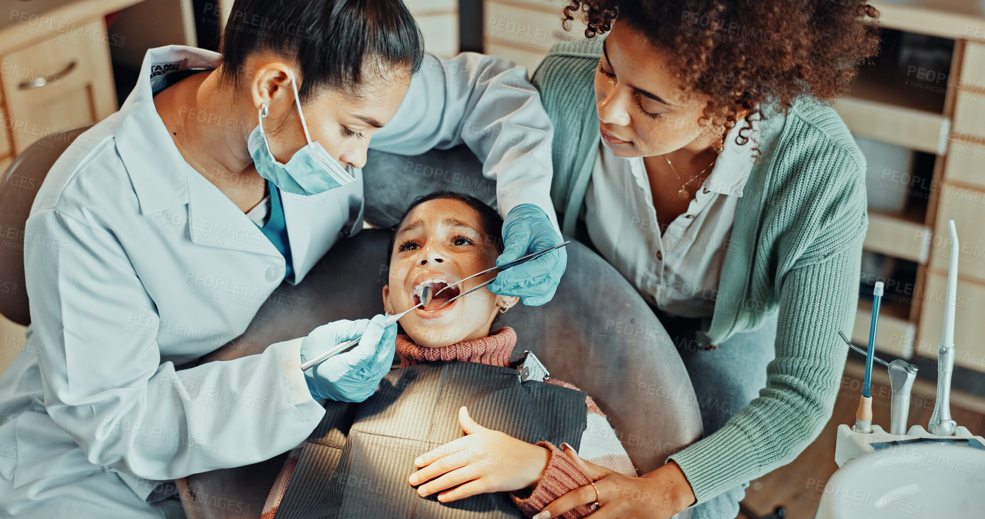 Buy stock photo Dentist, tools or girl with mom for cleaning, exam or gum disease in consultation for help. Orthodontist, child or above with mother for teeth whitening, oral care or treatment for mouth procedure