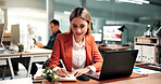Woman, laptop and writing in office with diary, record data and revenue analysis for company report. Coworking, person and analyst with computer, planner notes and graphs for business sales stats.