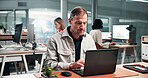 Businessman, typing and research in office with laptop,  stock market data and investment evaluation. Coworking, mature person and reading with computer for online trading, graphs and stats analysis.