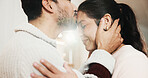 Forehead, kiss and happy couple in home, love and bonding with partner on break or marriage loyalty. House, flare and connection with spouse, relationship commitment and people with smile on weekend