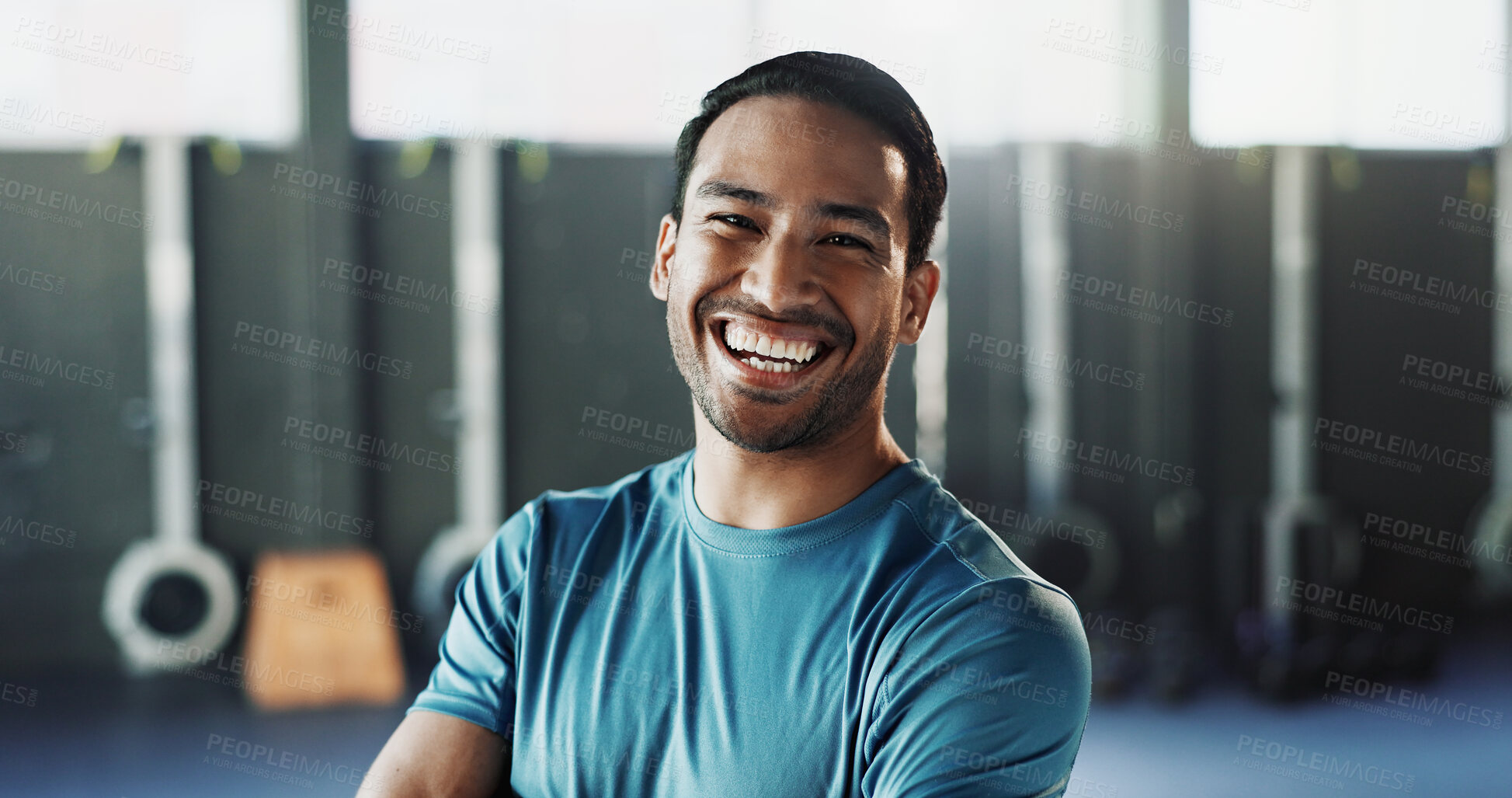 Buy stock photo Fitness, portrait or happy man in gym with pride, good mood or workout hobby on weekend break. Wellness, person or athlete in center with laugh, confidence or positive attitude in exercise activity.