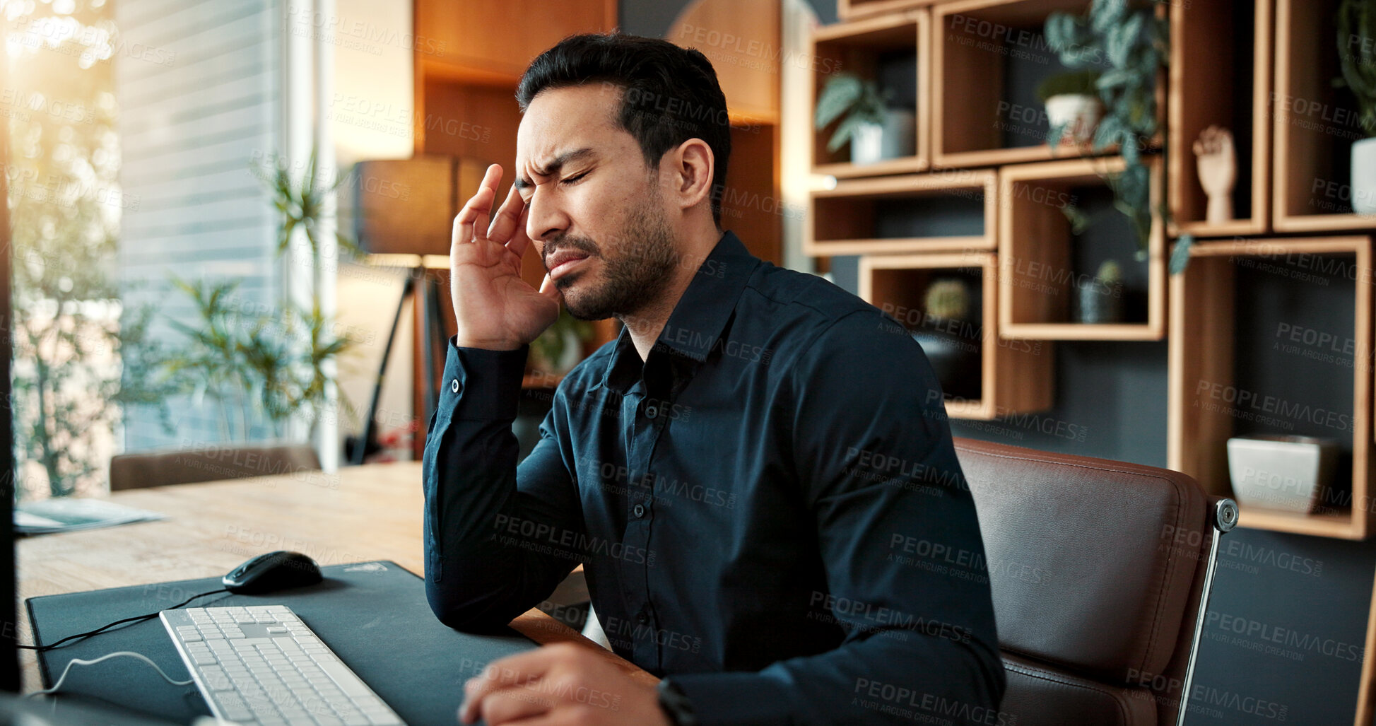Buy stock photo Businessman, headache or burnout with stress in office for muscle tension, discomfort or deadline. Frustrated, man or employee with migraine for mental health, overworked or pressure in workplace