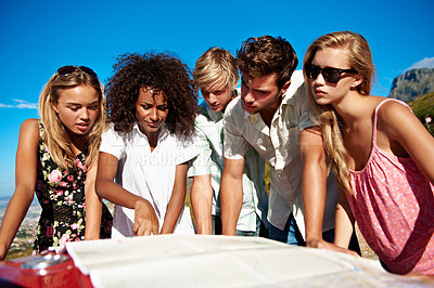 Buy stock photo Outdoor, road trip and friends with map on car, serious and route plan with info on summer adventure. Reading, direction guide and people with vehicle on vacation, travel and pointing at location
