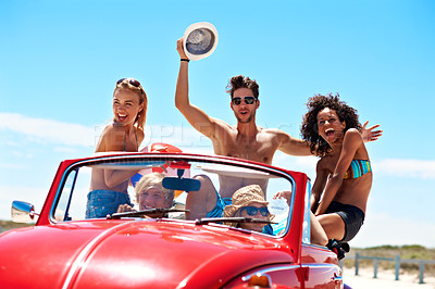 Buy stock photo Happy, friends and road trip in car for summer holiday, arms up or travel outdoor for bonding together. Portrait, excited people and drive in convertible vehicle with adventure, journey and vacation.