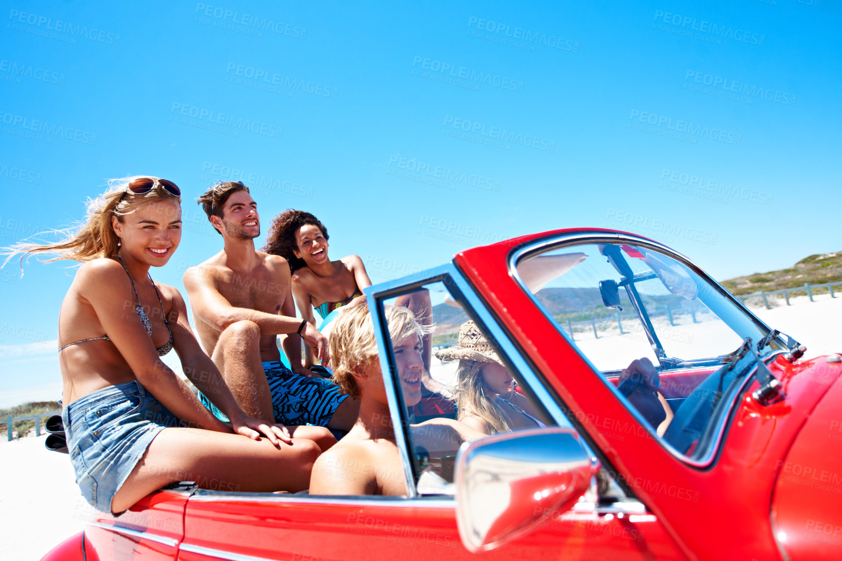 Buy stock photo Beach, happy friends and road trip in car for travel, adventure and bonding on summer vacation. Convertible, laugh and people drive on holiday with space, journey and relax in vintage transport