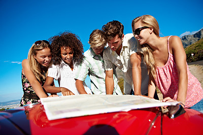 Buy stock photo Road trip, map and group of friends in nature for vacation, getaway or weekend with bonding. Happy, planning and people with navigation of route for summer holiday by car for travel together.