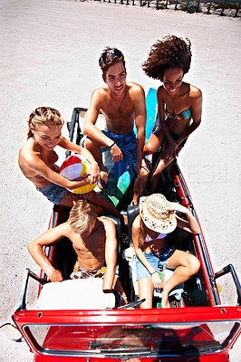 Buy stock photo Beach, happy friends and road trip in car for adventure, drive and bonding on summer vacation. Convertible, smile and people travel on holiday with ball, top view and relax together in transport