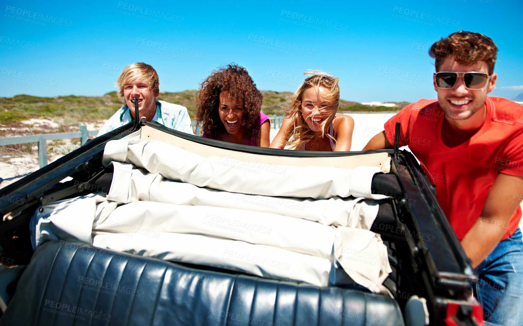 Buy stock photo Holiday, pushing or friends outdoor with vehicle, bonding together or problem solving on fun trip. Travel, collaboration or people with car recovery, group support or happy connection on summer break