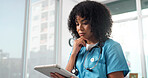 Healthcare, tablet and thinking with nurse in hospital for planning, report or review of results. App, medical decision and telehealth with thoughtful black woman in clinic for contemplation or ideas