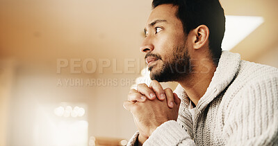 Buy stock photo Man, thinking and waiting with doubt in home for mental health, trauma or fear for anticipation. Anxious, nervous or male person contemplating with hope or phobia for past moment or memory in house