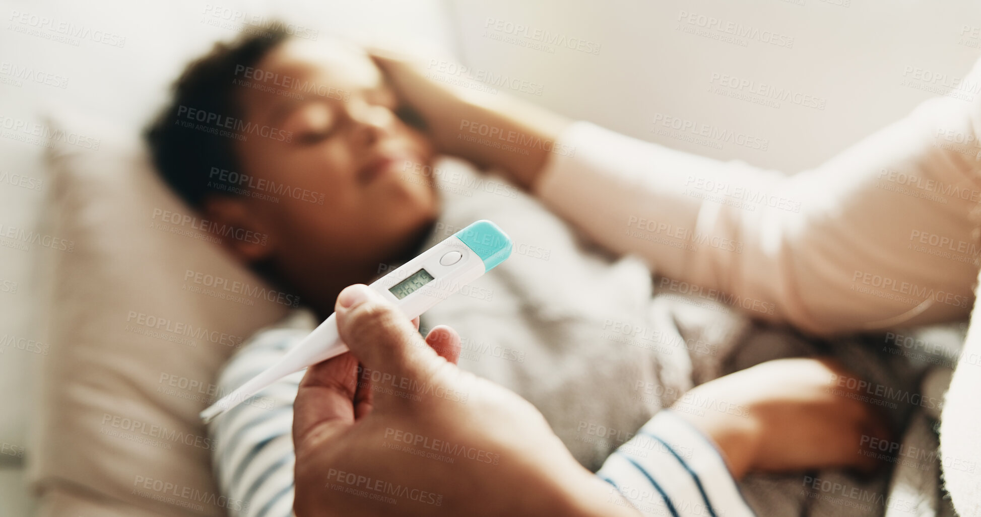 Buy stock photo Hands, mom and kid in home with thermometer, childcare and health monitor with flu symptoms. Sick, mother or child in living room with tech, parent comfort or temperature check in illness assessment.
