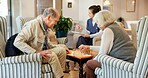 Senior, people and chess with board game in nursing home for strategy, activity or interaction. Elderly, man and woman with nurse or entertainment for cognitive thinking or problem solving in house
