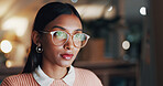 Glasses, reading and online with business woman in office for night, revenue report and planning. Portfolio research, overtime and investor project with employee in agency for asset management space