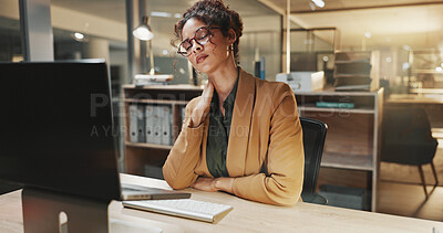 Buy stock photo Technology, neck pain and businesswoman in office at night with bad ergonomics at finance career. Computer, spinal injury and financial manager with deadline for investment project in workplace.