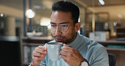 Buy stock photo Coffee, online and glasses with business man in office for research, caffeine break and night. Reading, drink and overtime with male person and mug in agency for project, planning and beverage