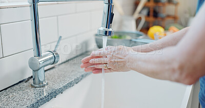 Buy stock photo Water, woman and washing hands in kitchen for hygiene, dirt removal and germ prevention at sink. Healthy habit, person and cleaning bacteria at home faucet for wellness, self care and cleanliness